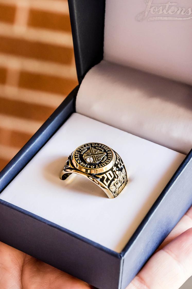 East Texas Baptist University gold class ring in ring box.