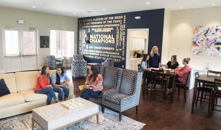 ETBU Tiger Softball Clubhouse inside with students