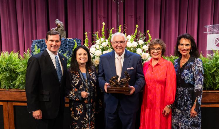 President Blair Blackburn and First Lady Michelle Blackburn stand with Dr. David Dykes and Cindy Dykes following Dr. Dykes being presented with the Servant Leadership Award