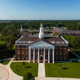 Drone image of brick academic building 