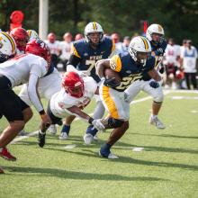 An action shot of football players during a game