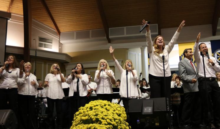 During the Perkins Family and Friends Reunion Concert, Alese Perkins Odom leads the choir in Then will the Very Rocks Cry Out. The choir and orchestra consisted of 300 individuals from various local churches. 
