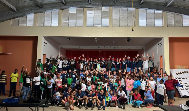 Large group of people smiling at the camera 