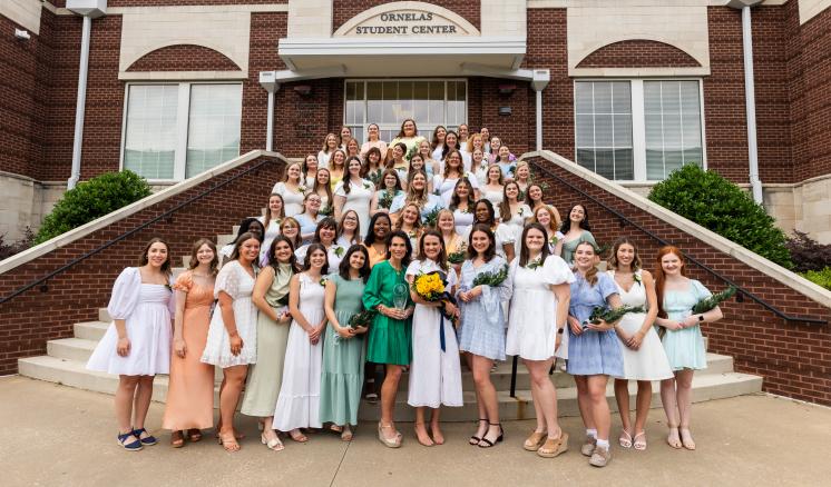 2024_senior_girl_call-out_img_3 Participants in ETBU's 77th annual Senior Girl Call-Out stand on the back steps of Ornelas Student Center for a group photo