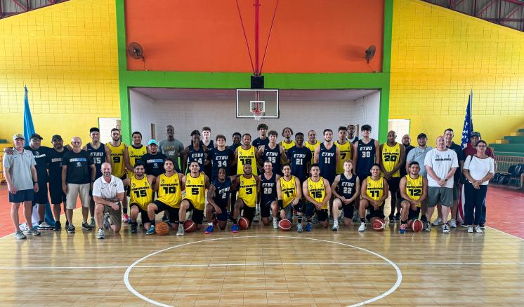 ETBU Men's Basketball Team poses for a group photo with the Honduras National Team