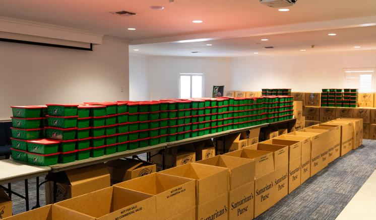 A large group of boxes sitting on top of a table