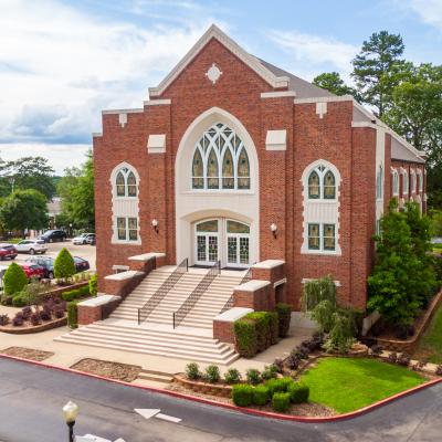 A drone image of a brick academic building at East Texas Baptist University