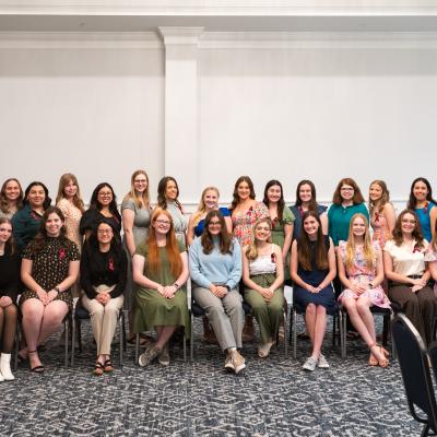 Students pose for a group photo after being inducted into the Alpha Lambda Delta Honor Society