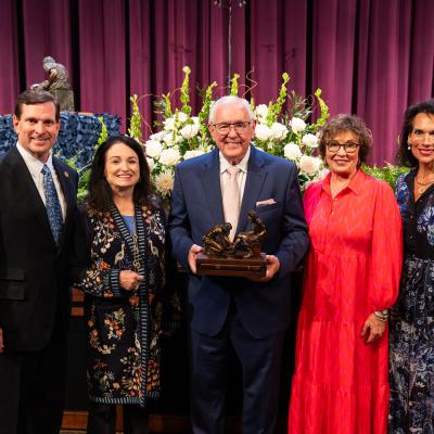 President Blair Blackburn and First Lady Michelle Blackburn stand with Dr. David Dykes and Cindy Dykes following Dr. Dykes being presented with the Servant Leadership Award