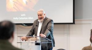 Man speaking at 2026 Colloquy