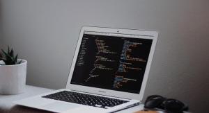 Computer in front of wall