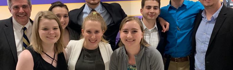 The 2019 ETBU Debate Team celebrates with their Coach, Dr. Cole Franklin. He received the International Public Debate Association (IPDA) 2019 Bennett Strange Coach of the Year Award at the IPDA National Championship Tournament and Convention.