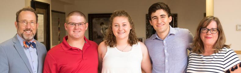 ETBU nursing students Colby Simmons, Stacie Simmons, and Joshua Hartley receive the Polly Cargill Scholarship during the reception held at the newly opened Marshall Grand.