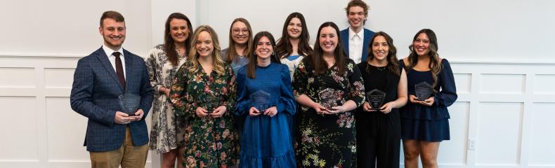 Eleven ETBU students stand together in a group after being presented with the ETBU Presidential Scholar Award